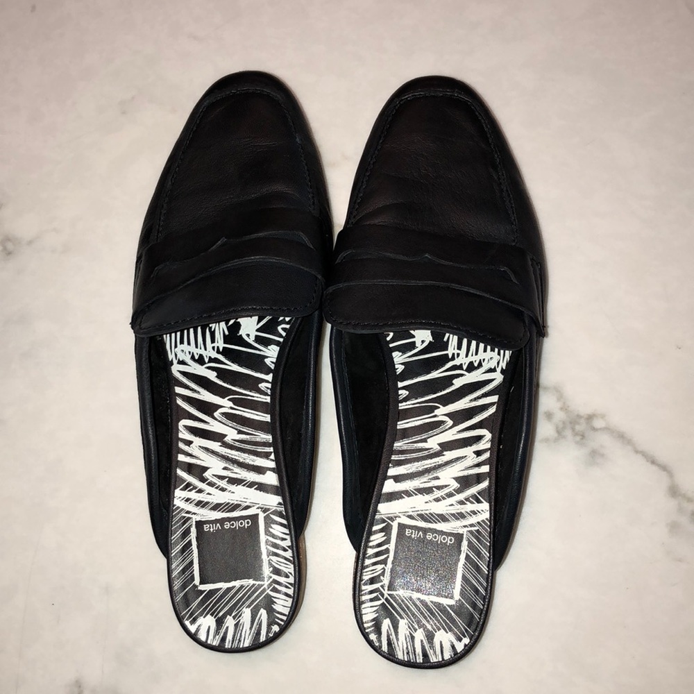 Dolce Vita black mules.